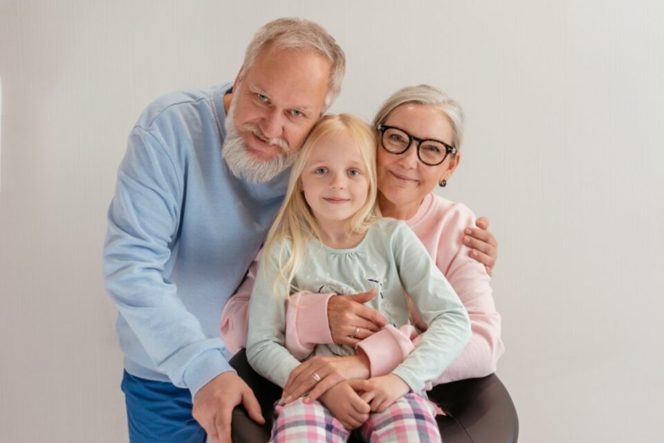 Grandparents with their granddaughter